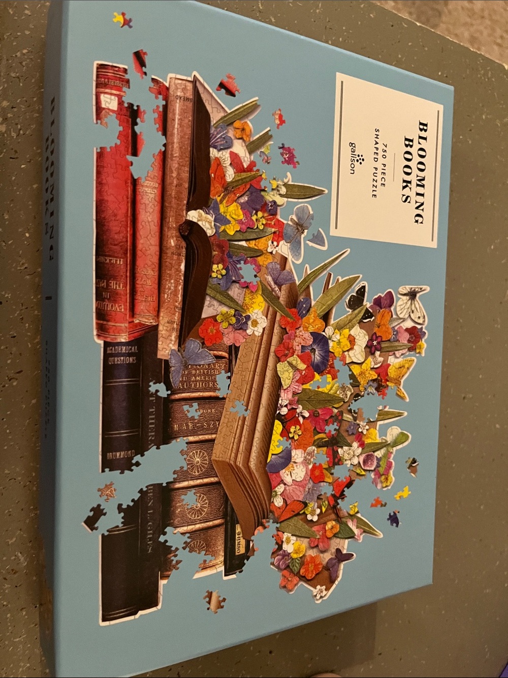 Galison 750 piece blooming books shaped puzzle